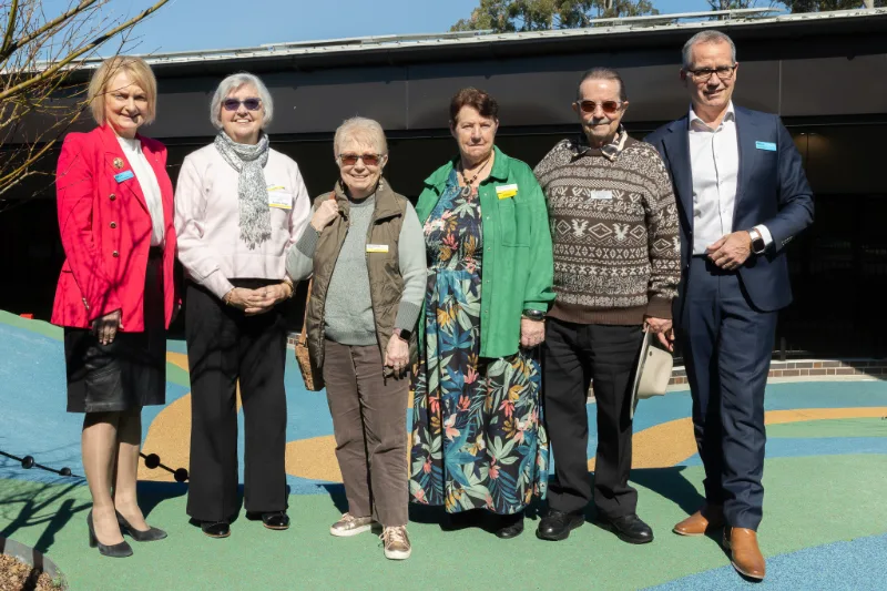 Lantern Club members and NextSense representatives gathered at the commemorative plinth unveiling.